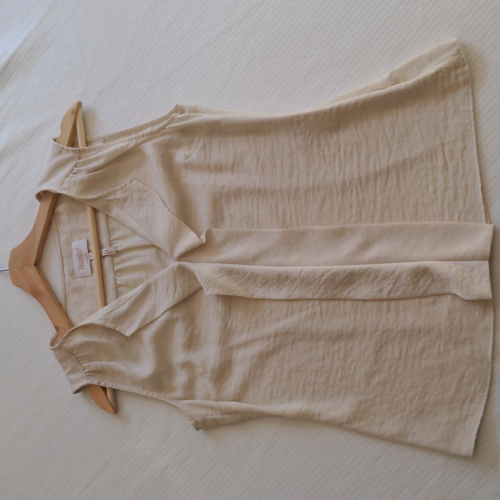 Ivory side-zip sleeveless blouse